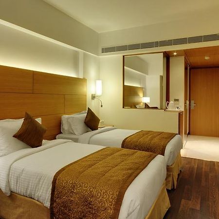 Hotel Platinum Rajkot Rum bild