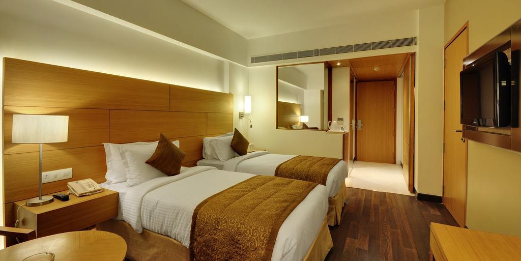 Hotel Platinum Rajkot Rum bild